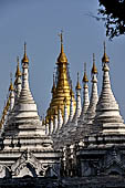 Myanmar - Mandalay, Sandamuni Pagoda. The entire ground is covered with 1749 small white pagodas with stone slabs with the Buddhist Tripitaka. 